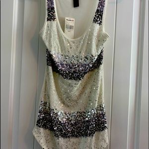 Buckle tank top with sparle embellishments on front.